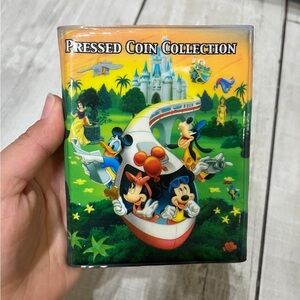 Walt Disney World Pressed Coin Collection Book With 27 Some Pressed Coins